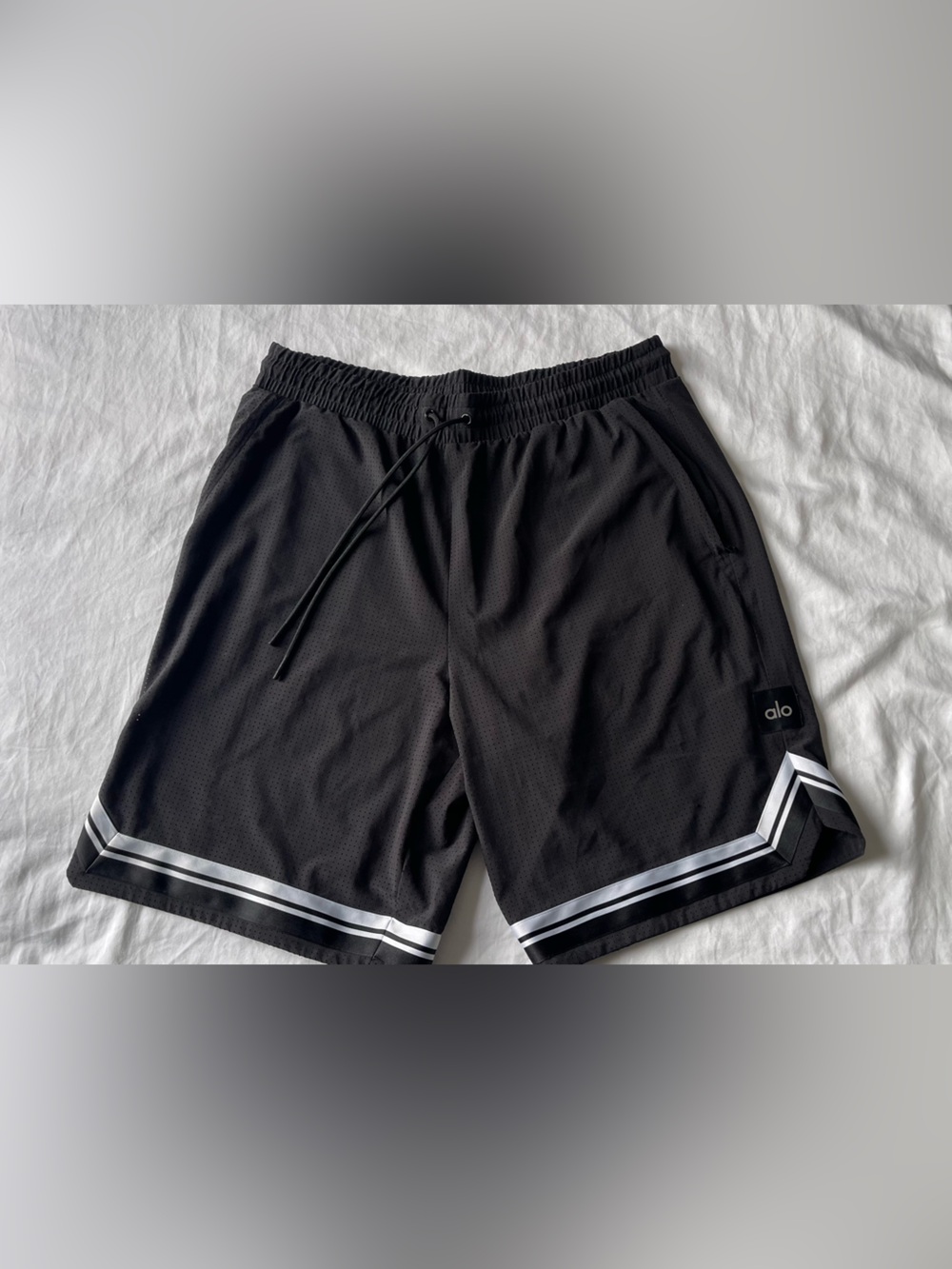 ALO Yoga Black Unisex Athletic Mesh Shorts with White Stripe Accents